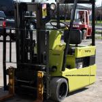 1473 Clark model TM20 serial # TM247-0082-8865FB, 4000 lb lifting capacity, 48 volt Electric powered, Three wheel style cushion tires, 104" raised height, Side shift, Weight with battery 8867 lbs, Weight without battery 5891 lbs,Year 1991, 1655 hours